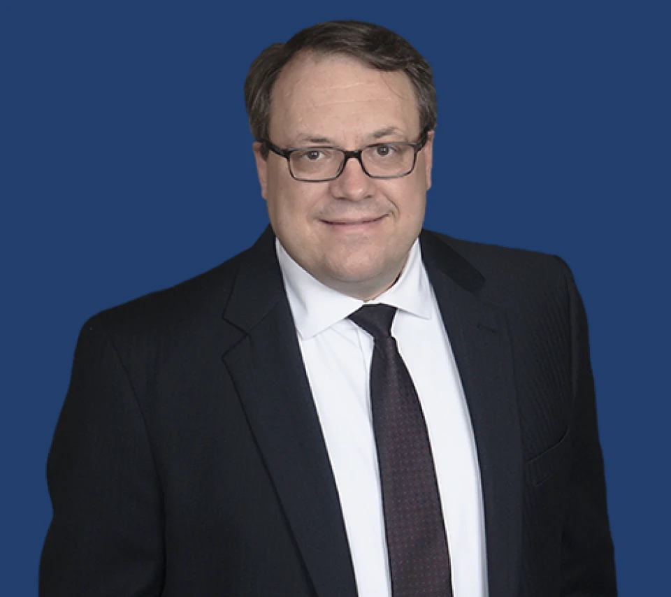 Portrait of Dr. Rick Jackomis in his dental office